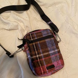 Vera Bradley plaid pocket purse with Long adjustable straps. Wallet purse